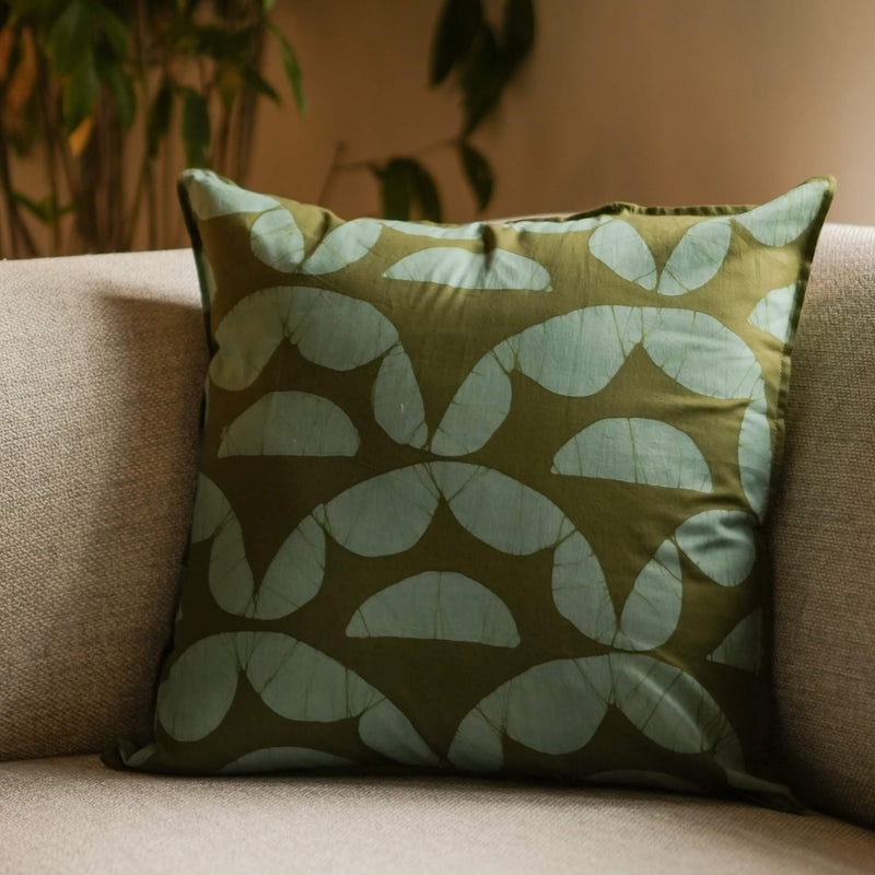 Aruna handmade cotton batik throw pillow in khaki green on seafoam blue, 18" x 18", by Kohomba Life.