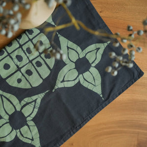 Beeralu handmade cotton batik throw pillow in seafoam blue on teal blue, 18" x 18", by Kohomba Life – close-up view.