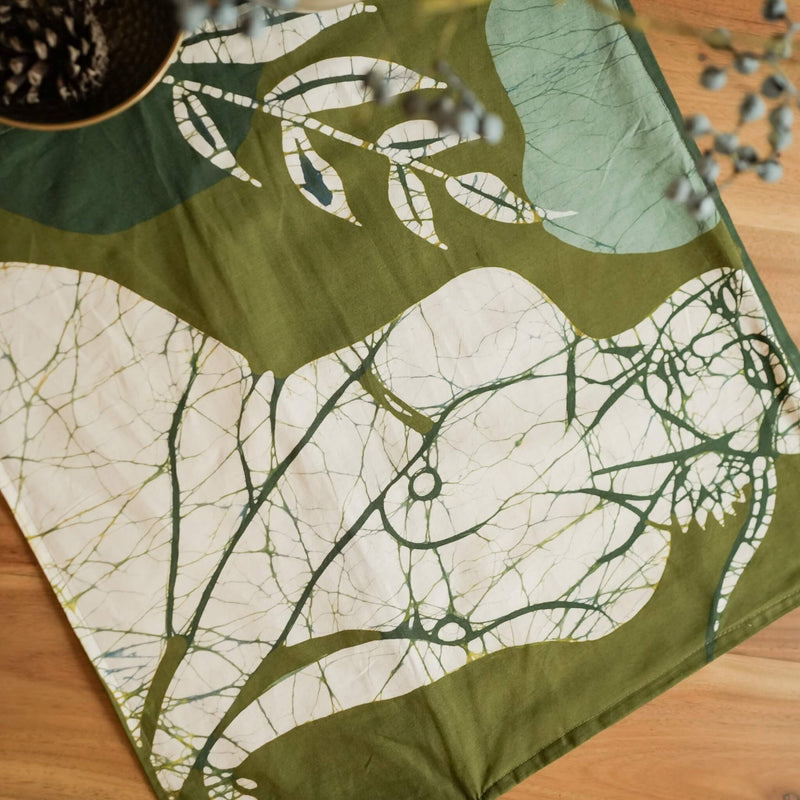 Lalana handmade cotton batik throw pillow in forest ivory on forest green, 18" x 18", by Kohomba Life – close-up view.